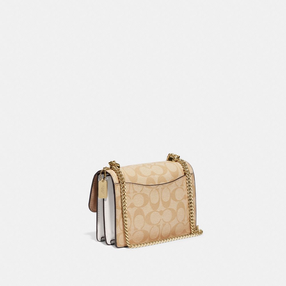 Mini Klare Crossbody In Signature Canvas